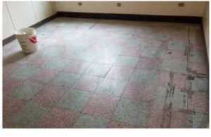 八德公寓磨石子地磚清潔前_局部黏膠附著黯淡無光